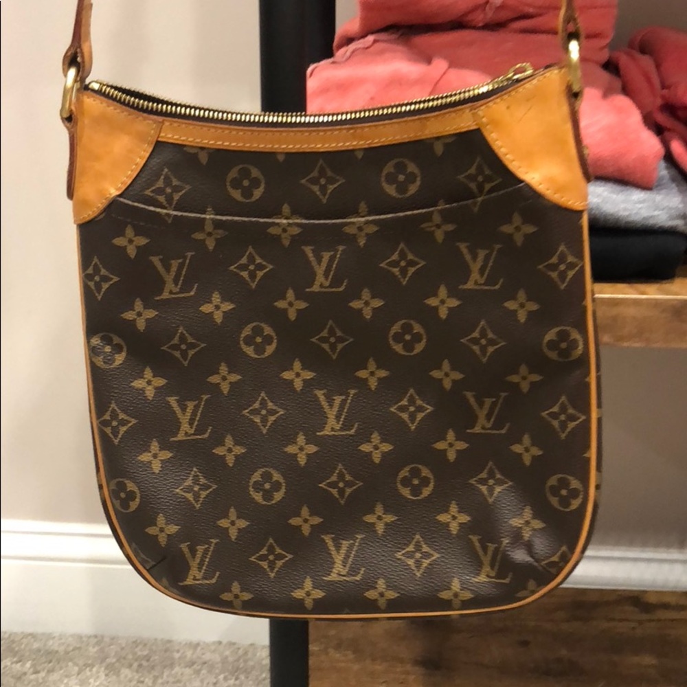 Authentic Louis Vuitton cross body bag. Odeon PM